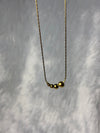 Gold beads pendent