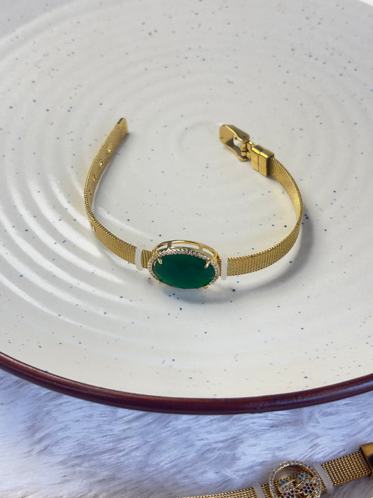 Bangle bracelet with green stone